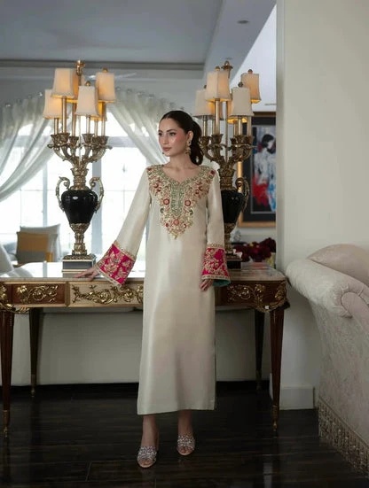 ALEEAN KHAN - KINZA clothing in ivory, pink, red, blue, green tones.